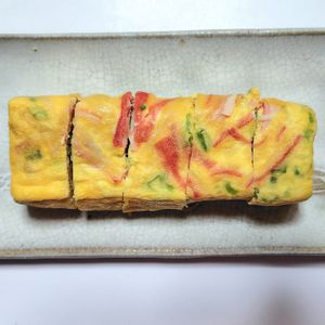 ふうかの作ってみた!投稿(彩り可愛い♡簡単節約副菜♪『かにかまとねぎの出汁巻き』)