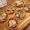餃子の皮で作る！パリッとミニピザの工程3