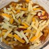 混ぜて焼くだけ！焼きチーズカレーうどんの工程3