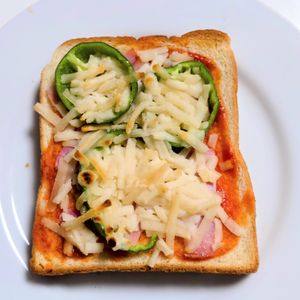 オレンジの作ってみた!投稿(【食パンで♪】簡単カレーチーズピザ)