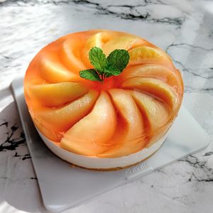 深い青の作ってみた!投稿(桃のミルクティーレアチーズケーキ)