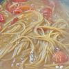 ワンパンで！味付けこれだけ！【イカとトマトの和風パスタ】の工程3