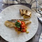 鱈のムニエル。プチトマトとグリーンオリーブのソース