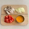 ほんのりカレー風味♩トマたまスープの工程1