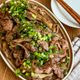 豚こまと舞茸《にんにく麺つゆバター炒め》