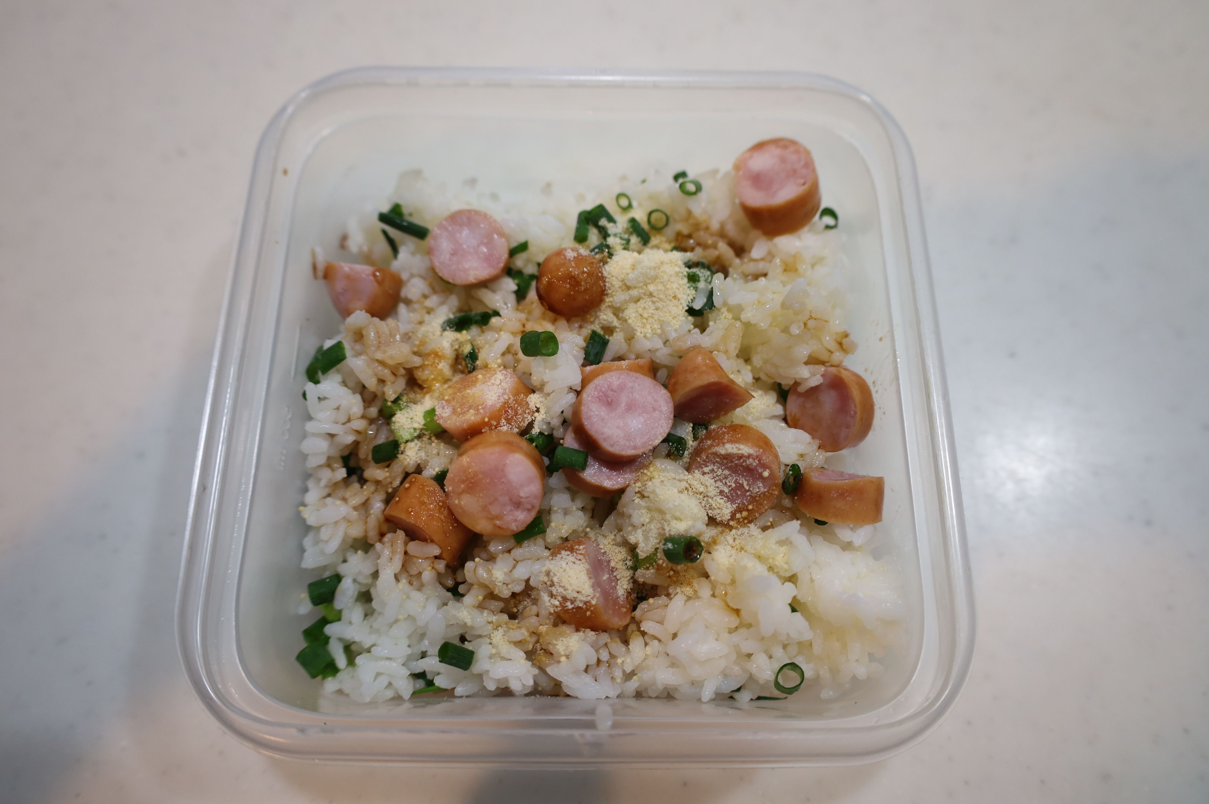 調味料とごま油を入れ全体をかき混ぜる