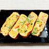 よっこの作ってみた!投稿(彩り可愛い♡簡単節約副菜♪『かにかまとねぎの出汁巻き』)