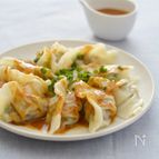 麻辣だれでいただく　豚ニラ水餃子